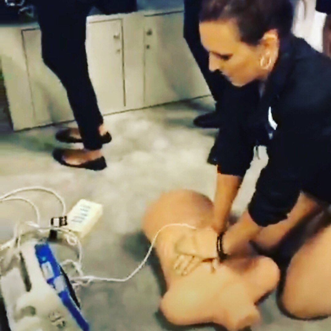 Code3Carolinas's tweet image. Code 3 girl, Miss August, is showing off her CPR skills at SAFRE!
