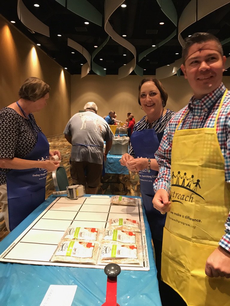 KYSenateGOP's tweet photo. .@kysenatepres & KY legislators participating in the #CampaignAgainstHunger at @SLCStates #SLC2017MS! One million meals packed by the SLC!!! https://t.co/fCNKfQqPMf