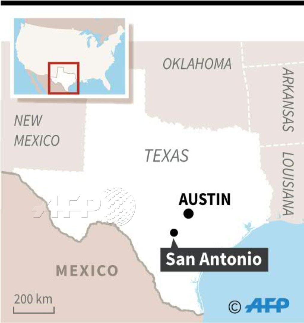 AFP's tweet photo. #UPDATE US manhunt for human traffickers after 8 people found dead inside truck at Walmart car park in San Antonio https://t.co/IeDNj6hplB https://t.co/e2grF31DhU