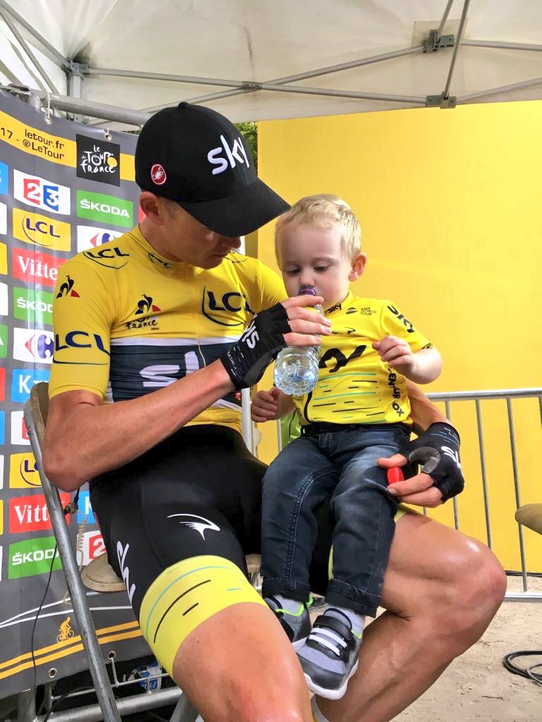 NetcompanyINEOS's tweet photo. Chris Froome: father first, bike racer second. The long road to Paris is all worth it. Cool jersey Kellan! #F4OOMEY https://t.co/qXWddiF0Lk