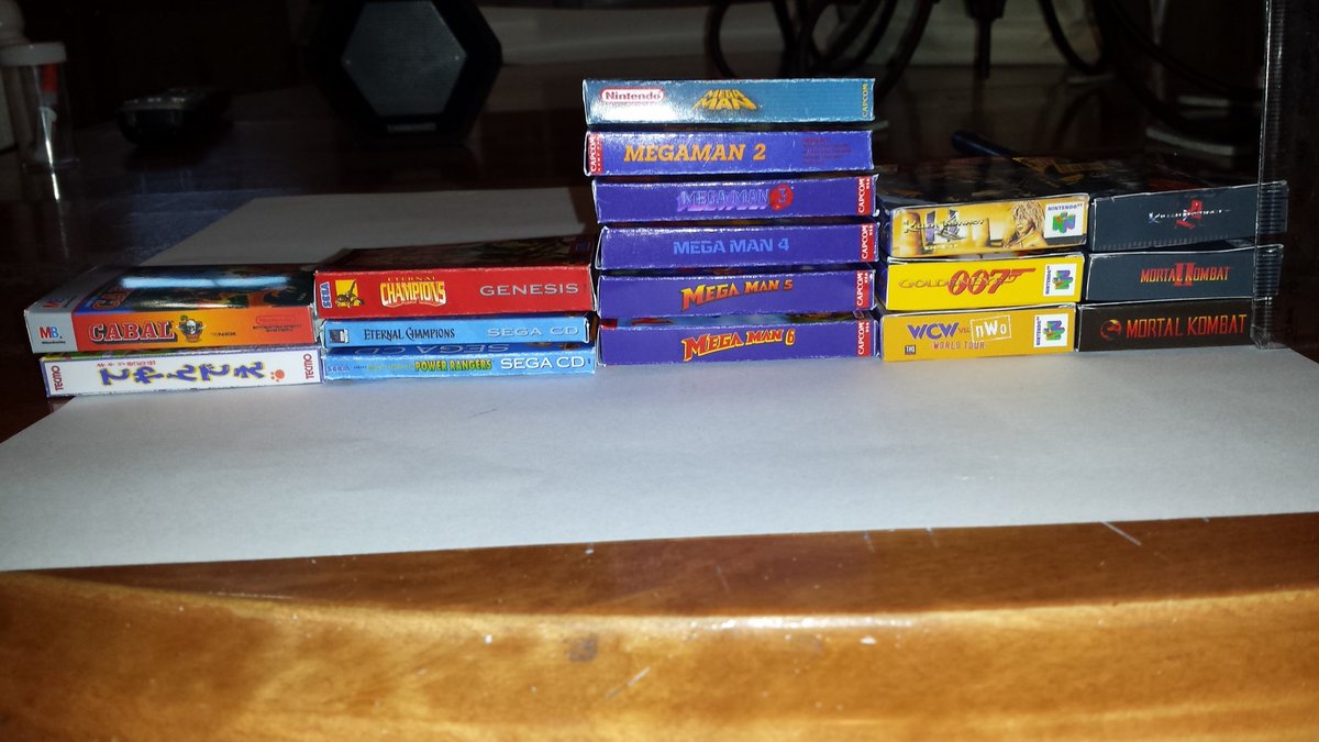 warmachine169's tweet photo. @CartFamNL Decided to put my creative skills to good use. Making myself  collection of mini boxes. #NES #SEGA # SNES #N64 #SEGACD https://t.co/PEhNdqIgbw