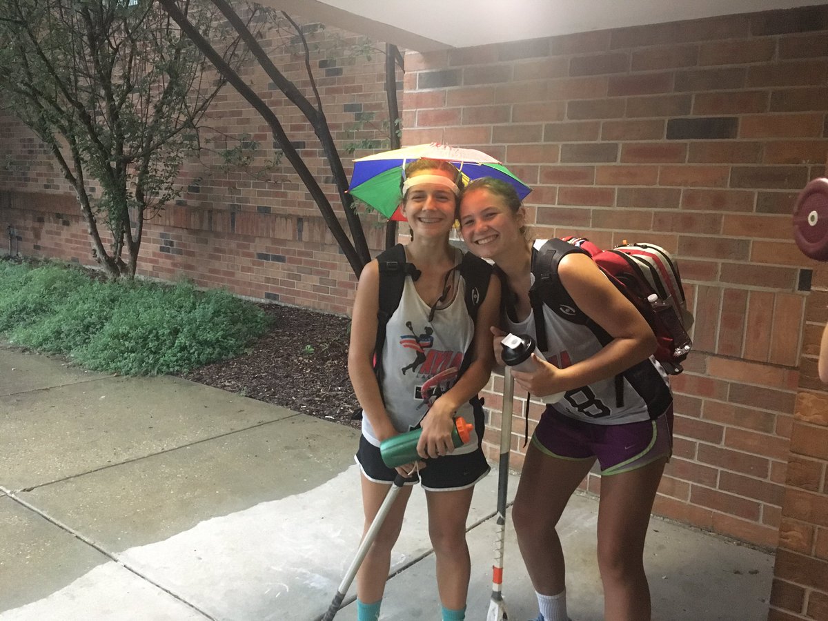 AYLACoolStick's tweet photo. These two were prepared when the weather quickly changed at practice today ⛈☂️#umbrellahat https://t.co/4jL2pyGDaO