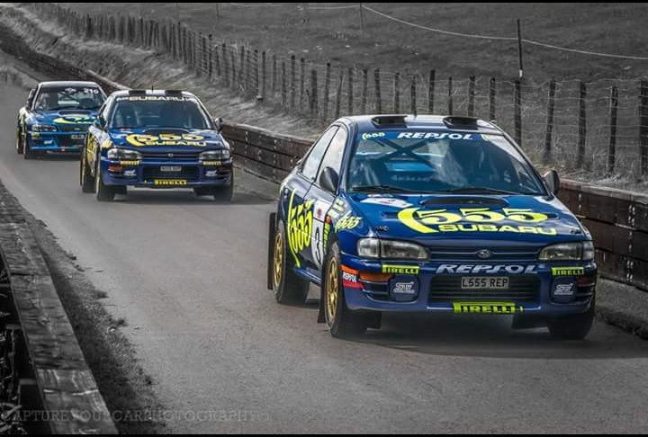 CaptureYourCar's tweet photo. 3 Iconic Subaru's in 1 shot. Taken @shelsleywalsh today. Amazing cars at an amazing venue and event #shelsleywalsh #SUBARU #WRC #555 https://t.co/1FREyYNKMk