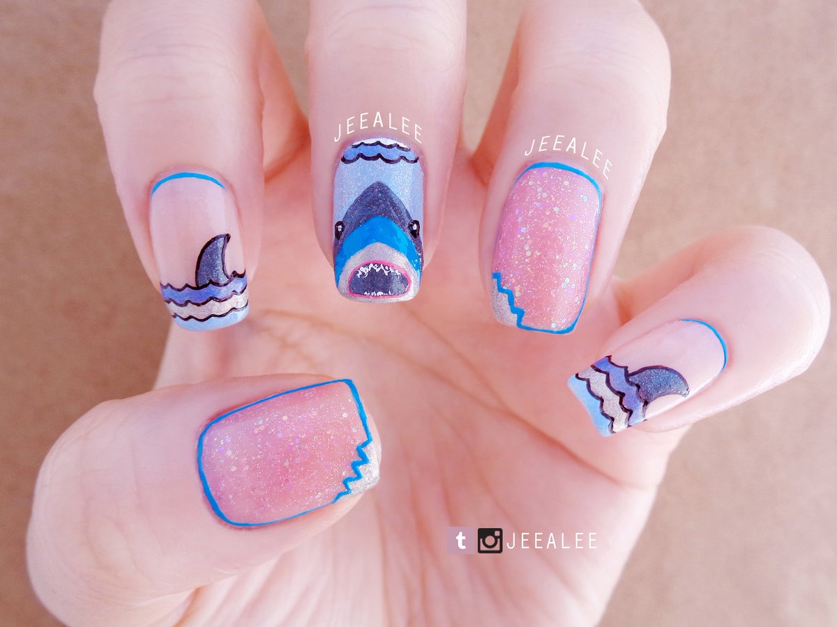 JeeA_Lee's tweet photo. Shark #nailart for #SharkWeek2017 🏊‍♂️🌊🦈 Waiting to watch #PhelpsVShark 😓 #teamphelps 💖 #nails #sharknails #sharkweek @SharkWeek #linework https://t.co/DCZ1oZBwxK