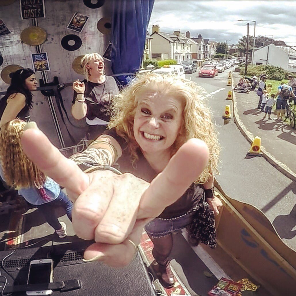 _Georgiegirl's tweet photo. Enjoyed channeling my inner rocker on the @porthcawparkrun carnival float. A great day of fun #porthcawlcarnival #innerrocker #funday https://t.co/MuYgEUaCHJ