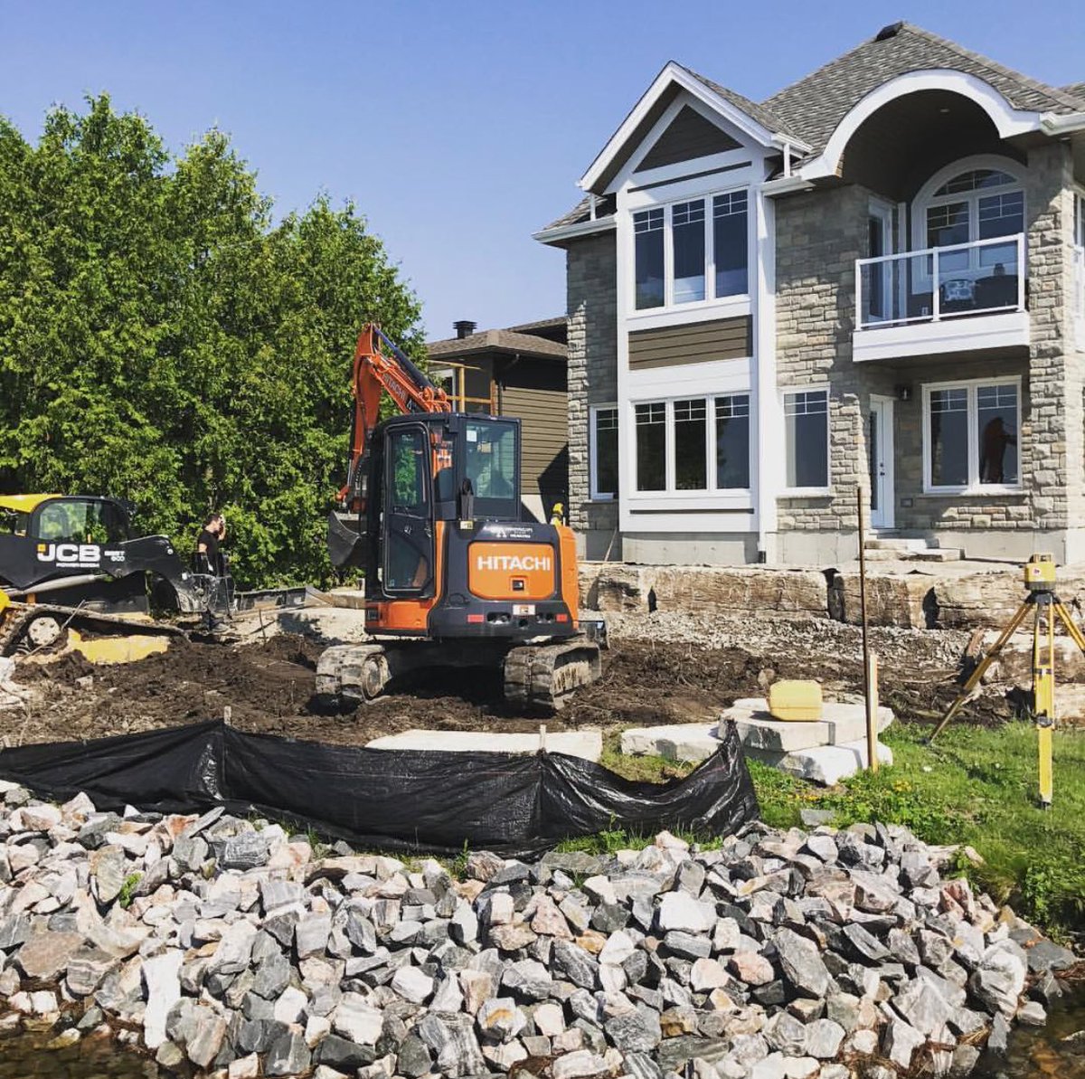 NorthscapeGroup's tweet photo. Installing a retained patio and some natural steps. #hardscapes #landscaping #sudbury #northernontario #lakeside https://t.co/ooAviybHHW