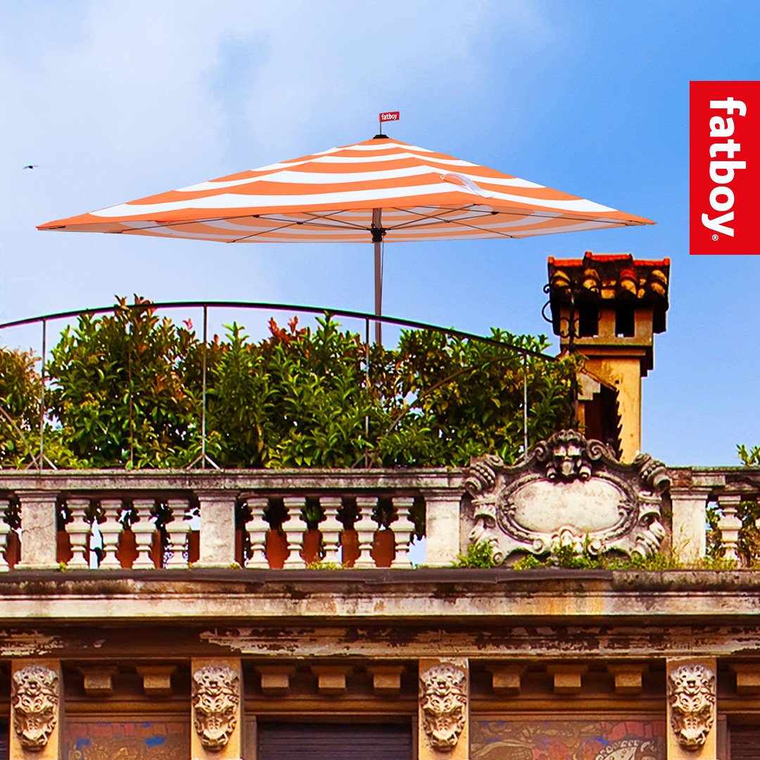 Discover how to create the ultimate summer with the #Fatboy Stripesol. Shop here: bit.ly/2tEH2VD  #parasol