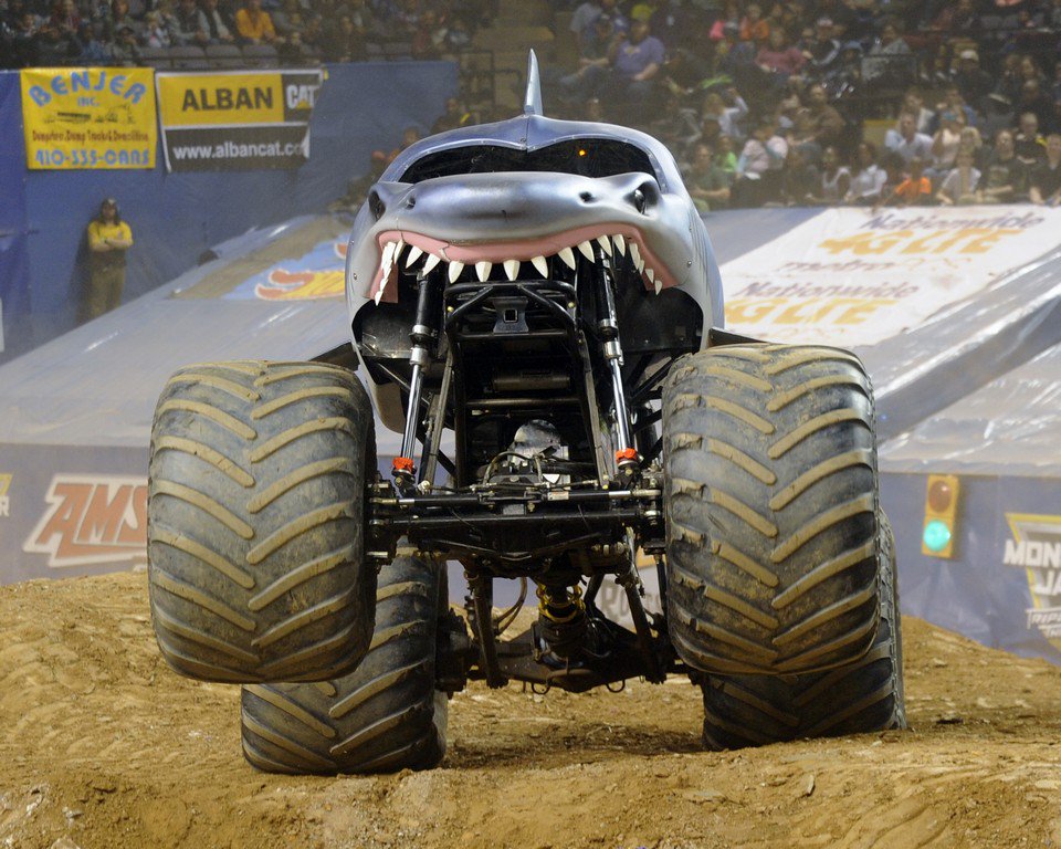 MonsterJam's tweet photo. Smile, @MichaelPhelps, @SharkWeek, &amp; @Discovery! You're going to need a bigger cage!! #MonsterJam #SharkWeek #TeamPhelps #TeamMegalodon https://t.co/14oJ6wHTAk