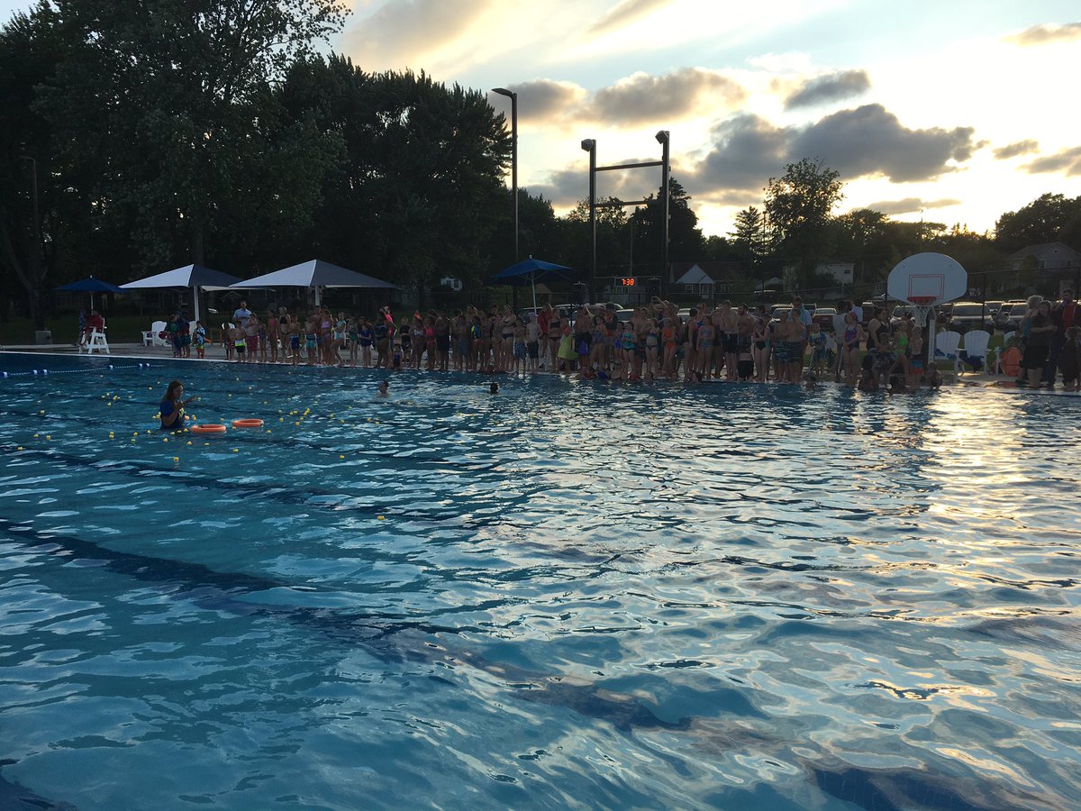 ChildrenWeek's tweet image. Lot's of fun at Erb Pool for the Children's Week kick-off! The movie "Trolls" starts at 8:30!