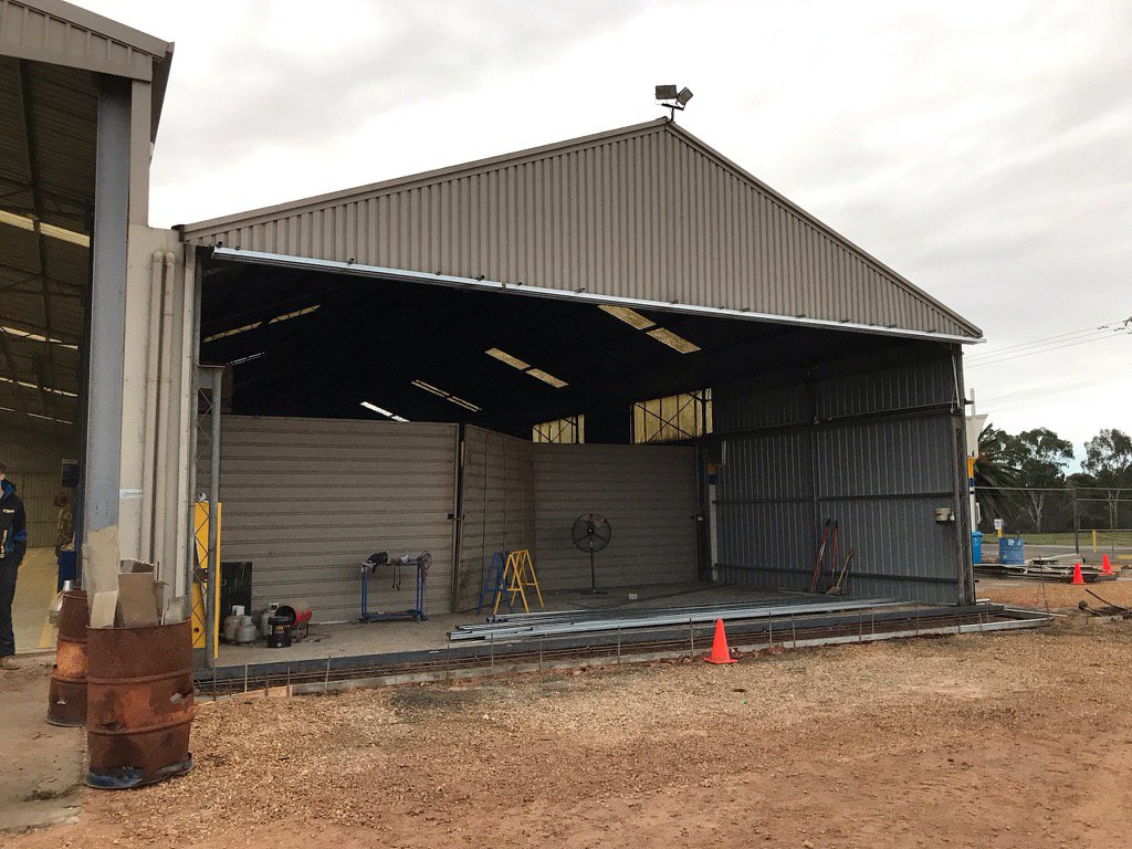 reneeboozer's tweet photo. New shed doors being put on the old workshop at saddleworth! Always a bastard to open 😁 https://t.co/jXg7gj6SCy