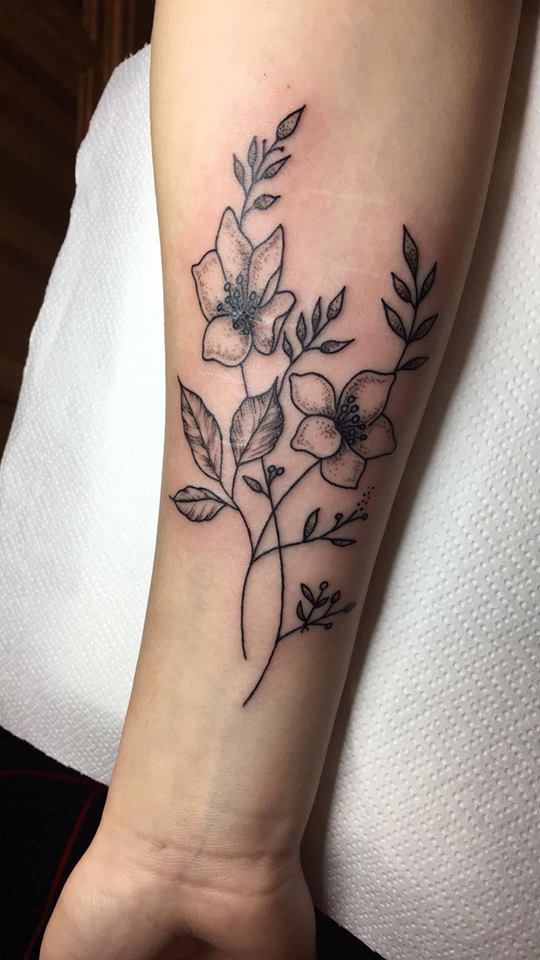 Dainty flowers covering scars by Anne.