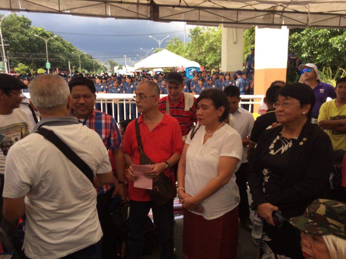 gmanews's tweet photo. LOOK: Left-nominated Cabinet secretaries attend anti-Duterte rally #SONA2017 https://t.co/auK6P5LXLA https://t.co/QdGn7JaDd5