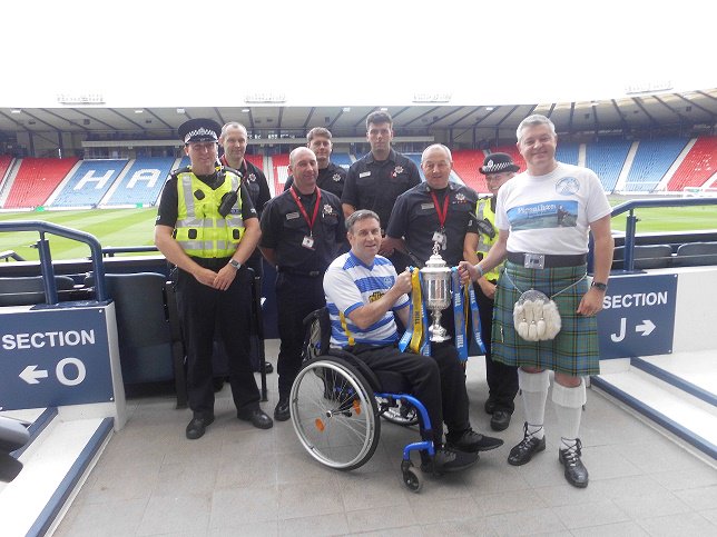 GlasgowSEPolice's tweet photo. Well Done @StuMcMillanSNP piping @Hampdenpark as part of a piping tour of 42 stadiums for Andy Adams Fund #Pipeathon2017 @scotfire_glasgo https://t.co/maLF68dumE