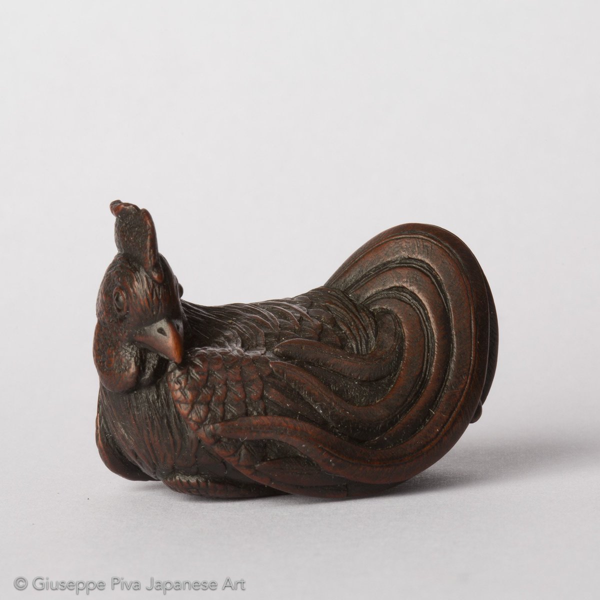 A WOOD NETSUKE OF A COCKEREL, BY HOKYUDO ITSUMIN
giuseppepiva.com
#netsuke #itsumin #cockerel #japaneseart