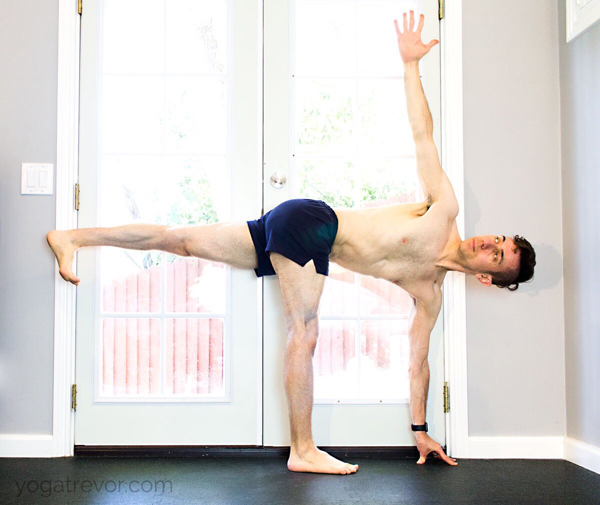 YogaTrevor's tweet photo. The new home Yoga space. Still learning the angles of the room. #revolvedhalfmoon #yogiphotographer #parivrttaardhachandrasana https://t.co/ZmXrQOKfWd