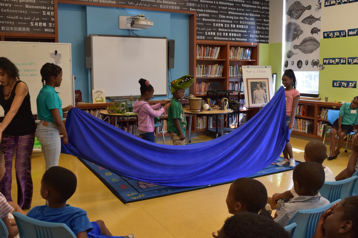 SummerREADS410's tweet photo. Kids at SummerREADS at Arlington reenact the story of The Hunter Man and the Crocodile w/ @arts4learning teaching artist Katherine Lyons. https://t.co/SHLINNWxx2