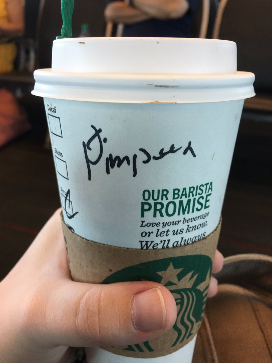 Starbucks cup with an illegible name on the side. It probably begins with 'P'