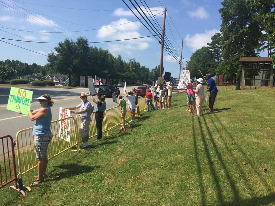 IndivisibleGCo's tweet photo. Behind bars again today for the Kill the Bill protest. About 30 people turned out. Thank you all! 7/18 #tuesdaywithouttillis #killthebill https://t.co/lRGzPzTldk