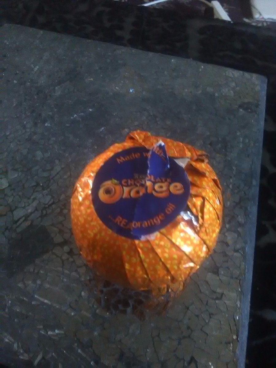 lil_pug's tweet photo. Nothing better than eating a #Terryschocolateorange while working :) #ChocolateLover https://t.co/5ibiBmGU95