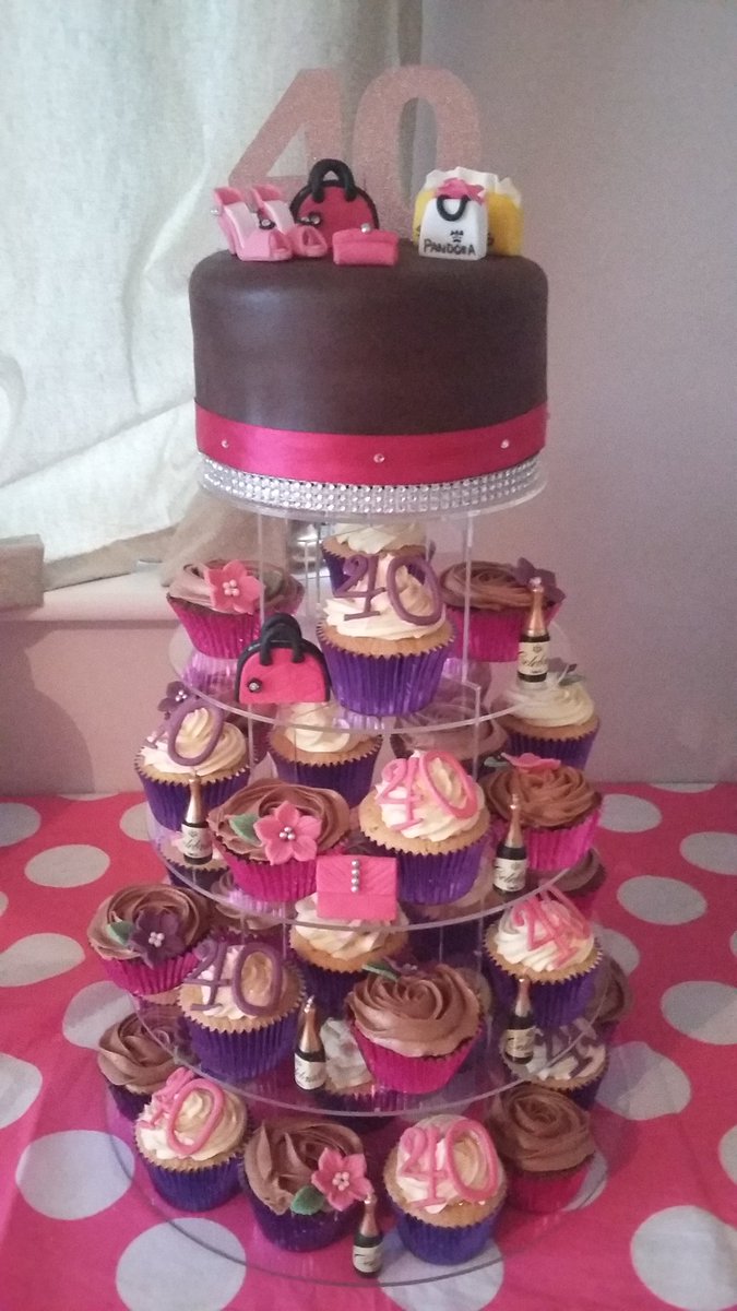 justpaul28's tweet photo. My friends 40th cupcake tree.. choc sponge with choc buttercream and choc fondant.  Handmade shoes and bags very yum https://t.co/Vbwd3P92KG