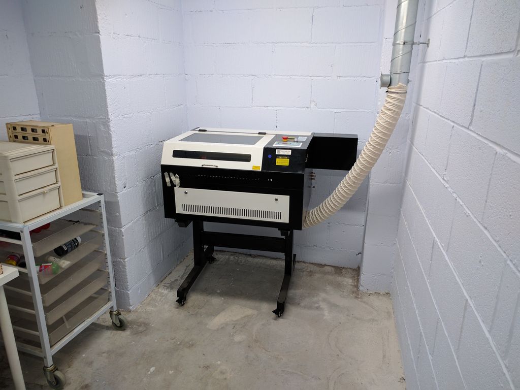 The <a href="/AddSharks/">JustAddSharks Lasers</a> 
laser cutter is in it's new home... Don't ask how