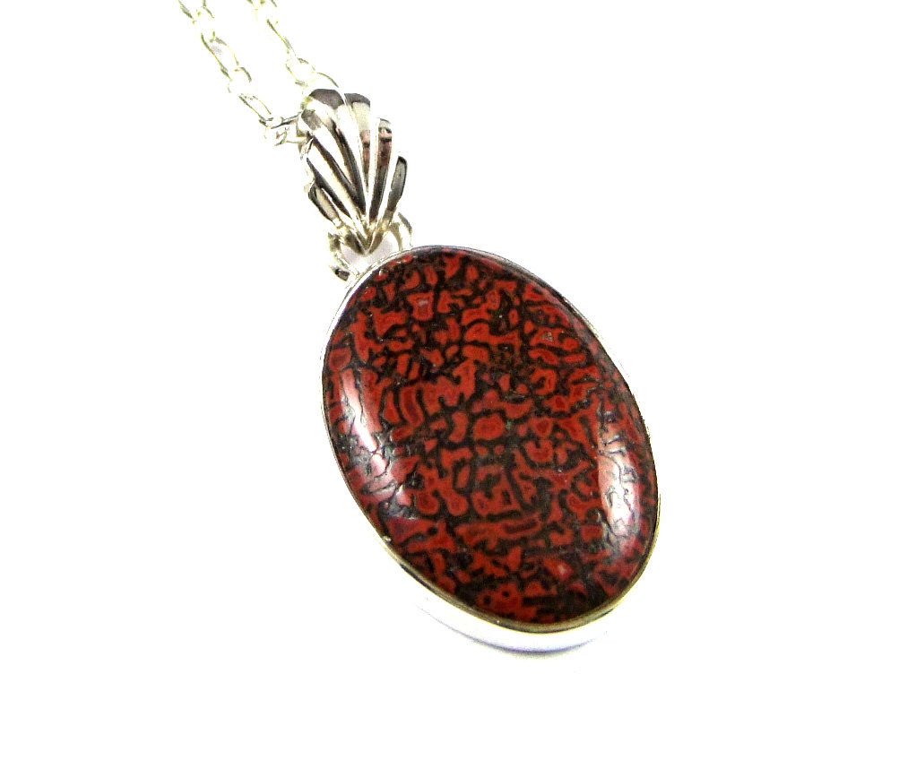 TheSilverBear's tweet photo. Superb Red Dinosaur Bone Sterling Silver Pendant https://t.co/2CiEBrVgbF #dinosaurbone #gembone #dinobone @thesilverbear https://t.co/nT9DjXN7Pc