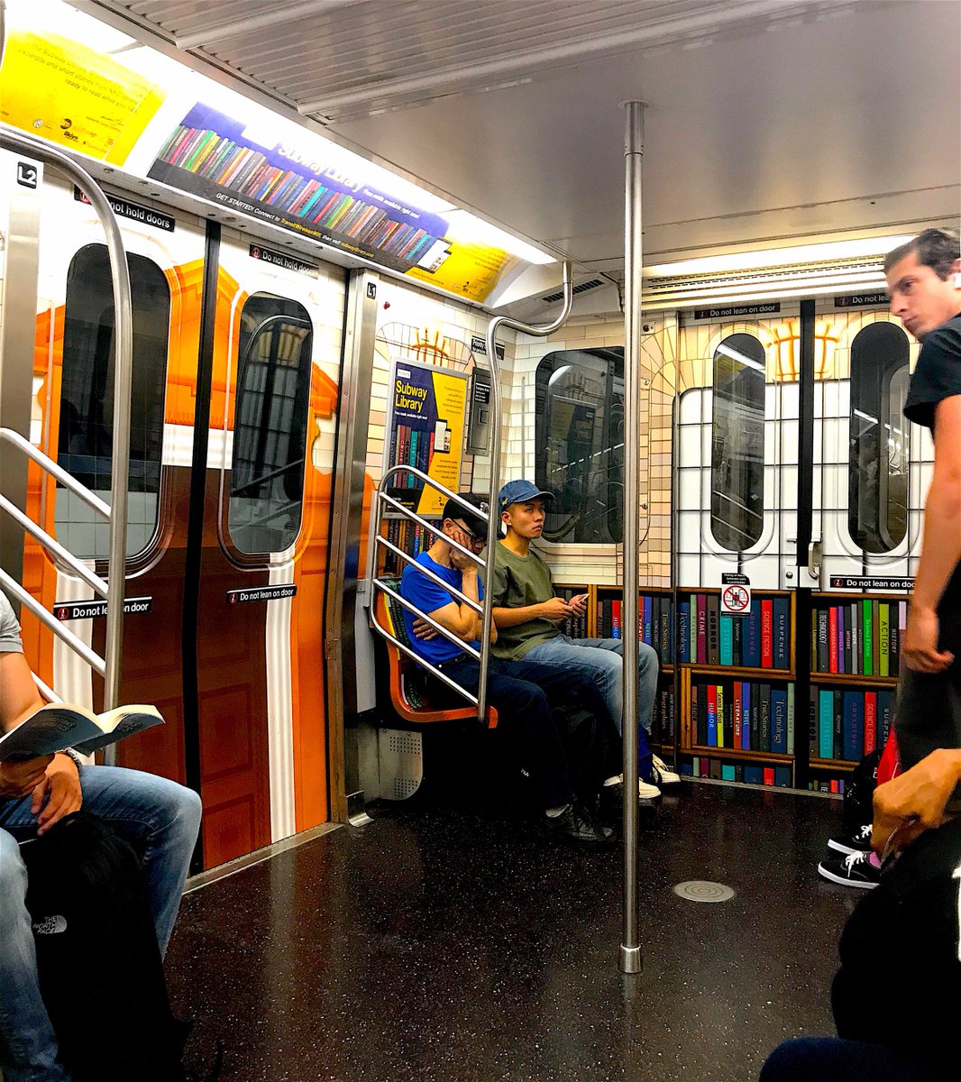 lidpublishing's tweet photo. Reporting from LID's first #SubwayLibrary car! Thanks for all the knowledge, @MTA @nypl @BKLYNlibrary @QueensLibrary 🤓📖📚 https://t.co/4pCIS2xSZ1
