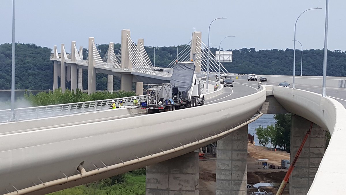 stcroixcrossing's tweet photo. Crews began chip sealing the Loop Trail on the bridge last week and will continue chip sealing on the trail this week. Photo from July 20. https://t.co/s2TQ64f33m