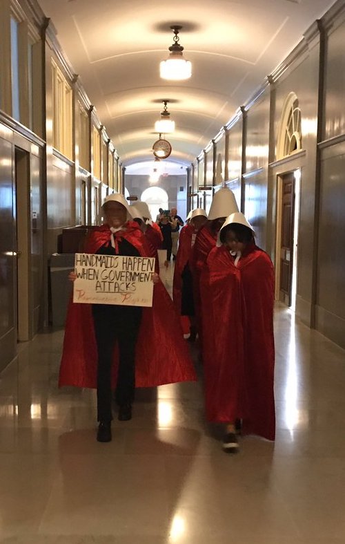 ppgraction's tweet photo. #MOHandmaids have returned to the Capitol to call out Gov. Greitens & #MoLeg for attacking #ReproRights in special session. #HandmaidsTale https://t.co/q6jt6mrY1w