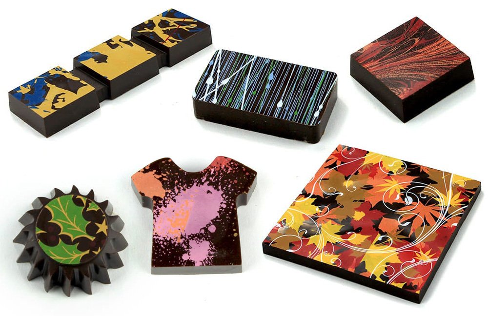 Our latest blog post: How to Use Magnetic Transfer Molds to make decorated #chocolate pieces: bit.ly/2tvK3Ft