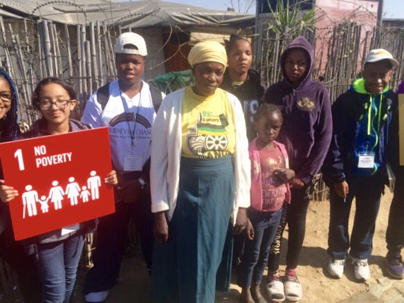 ARProject's tweet photo. @Journey4Change Ambassadors & #CapPrep teachers Ms. Moye & Mr. Johnson advocate for @SDGoals in Diepsloot, #SouthAfrica. #SDGs @DrStevePerry https://t.co/9bjrH1vDQs