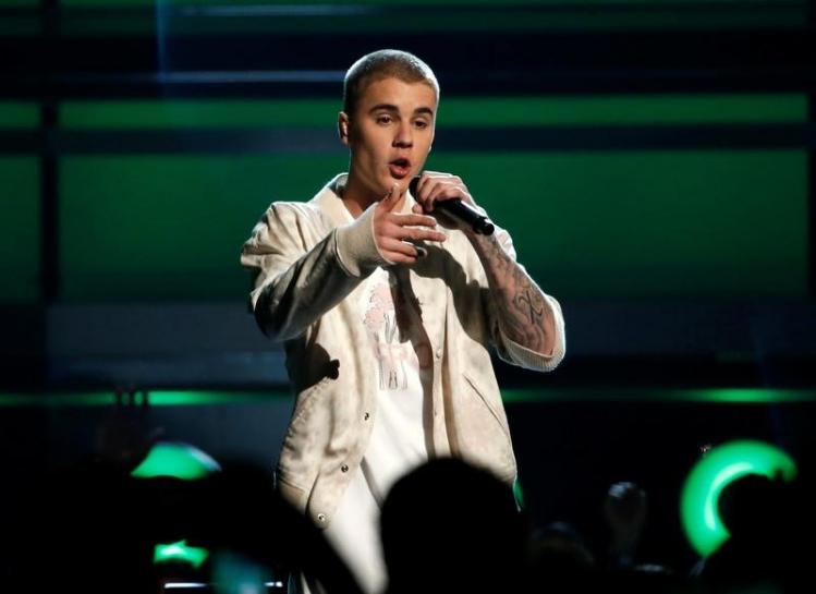 Reuters's tweet image. Justin Bieber cancels rest of 'Purpose' tour without explanation reut.rs/2vUaLrT