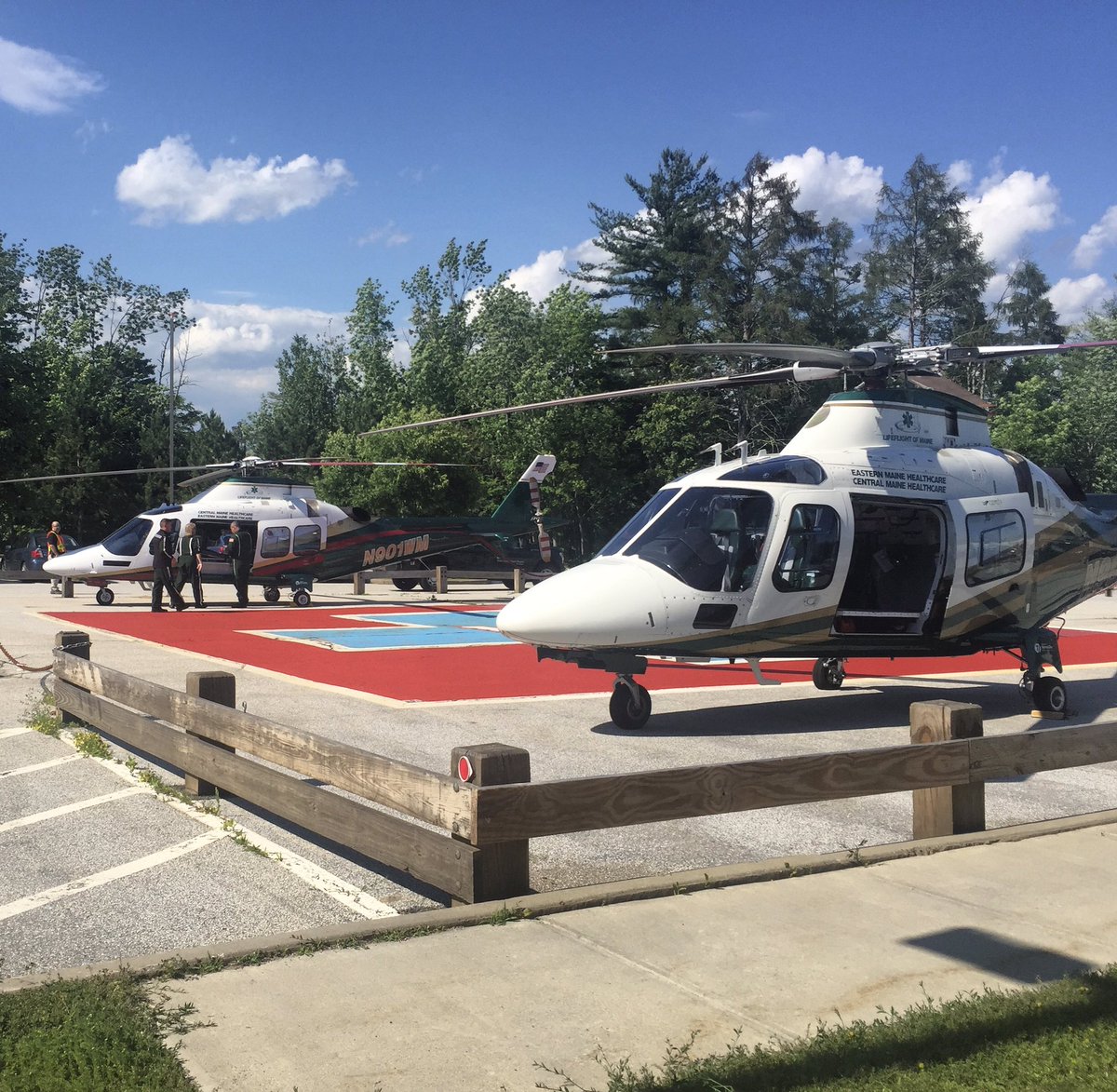 LifeFlightMaine's tweet photo. (2/2) It's quite a sight to see 2 of our helicopters on a helipad at the same time. 📷Pilot Dave Burr 🚁#N901WM & #N901EM #maine #hems #EMS https://t.co/D5kYC8BgYB