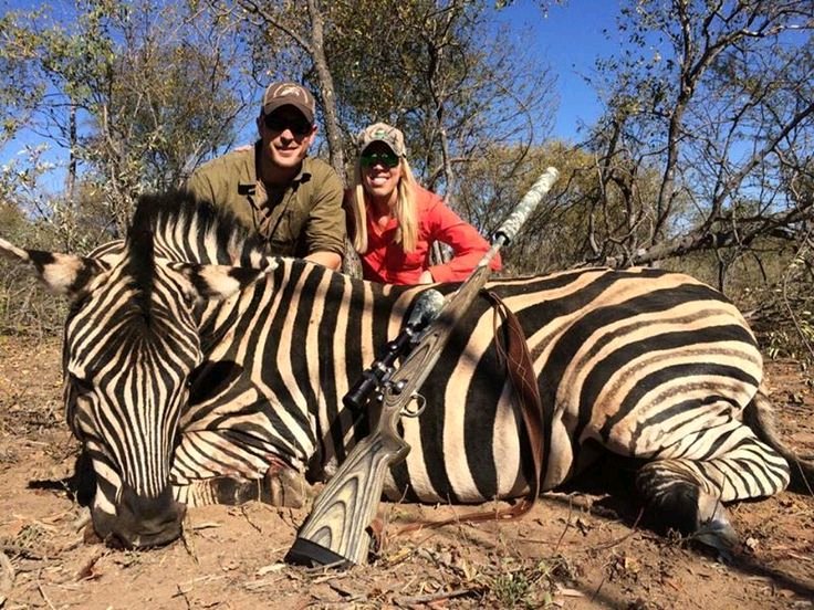 Protect_Wldlife's tweet image. Two brave trophy hunters pose proudly after killing a really fierce zebra...FOR FUN!

RT if you agree this is BARBARITY that it  MUST STOP!!