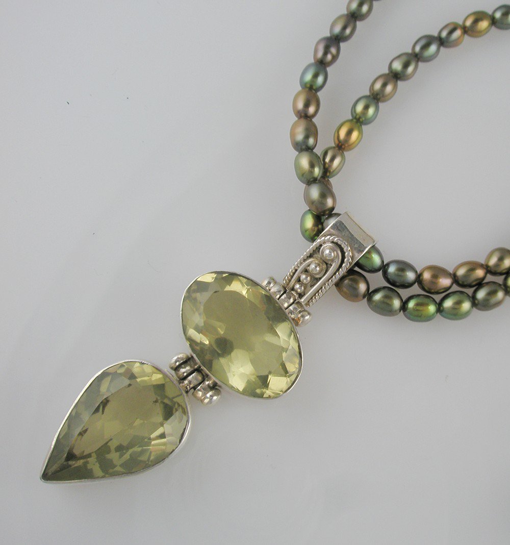 stoneberri's tweet photo. Statement Multi Strand Necklace with Lemon Quartz Pendant on Do… https://t.co/LY6WrMe8XD #Stoneberri #DoubleStranded https://t.co/oJWGGM3tzW