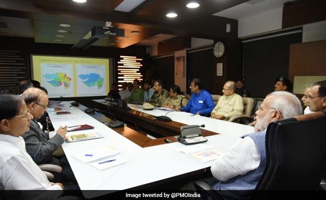 ndtv's tweet photo. PM announces ex-gratia of 2 lakhs for families of those killed, and Rs 50,000 for those seriously injured, due to floods in Gujarat https://t.co/wxc5u34Kf7