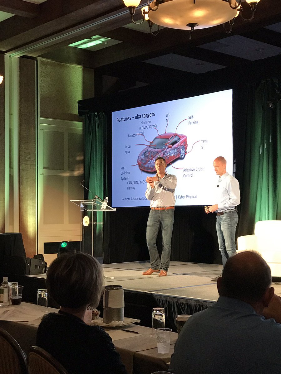 cathyNAMIC's tweet photo. "Hackers for the people" Chris Valasek &amp; Charlie Miller tell #insurers about car #security risks. #futureofautosummit @NAMIC https://t.co/rSzCGeryMK