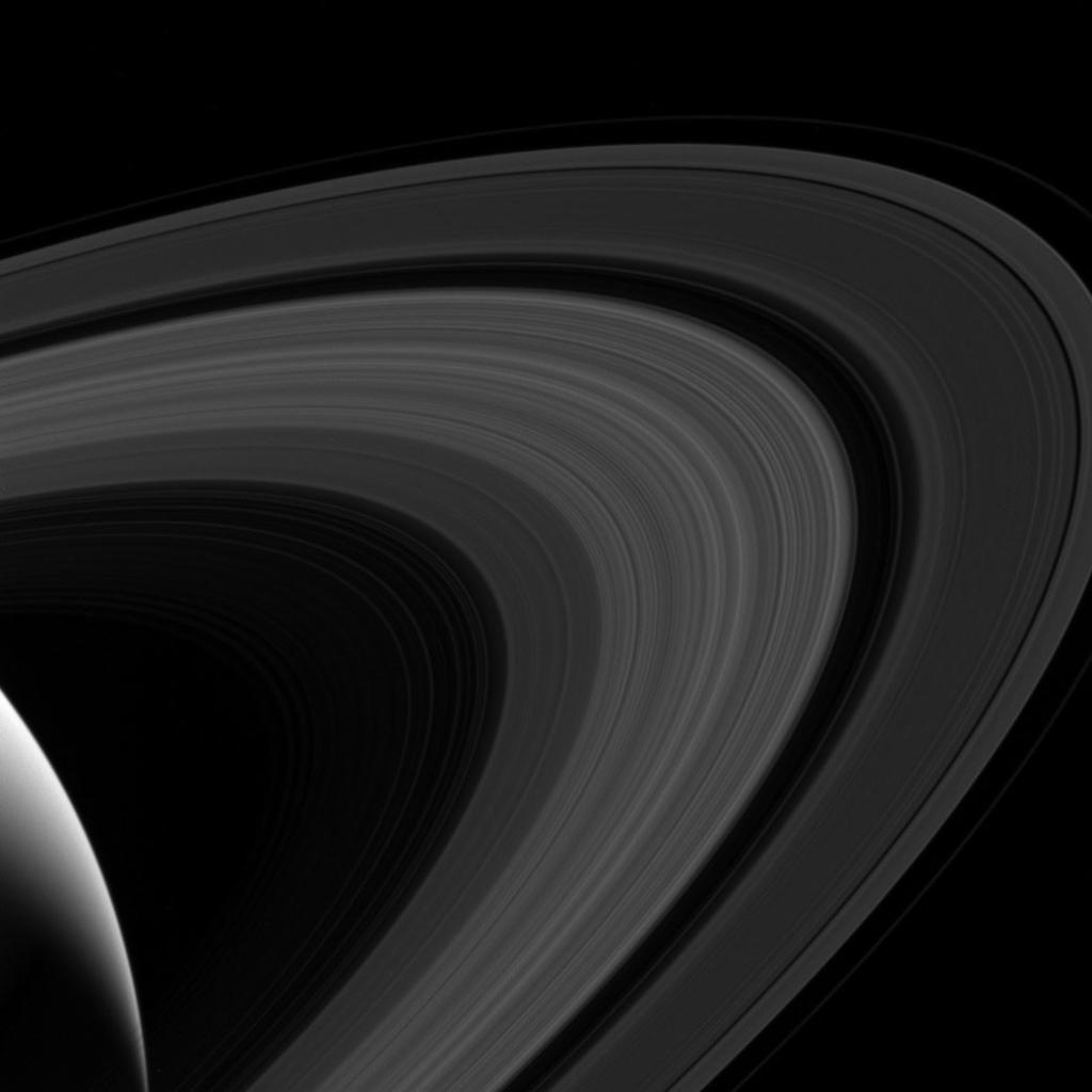 NASA's tweet photo. Not a rainbow, but a ring-bow. Although the rings lack the many colors, they still arc across the sky of Saturn: https://t.co/8Zw9kVKXmA https://t.co/m8jf2fvxLT