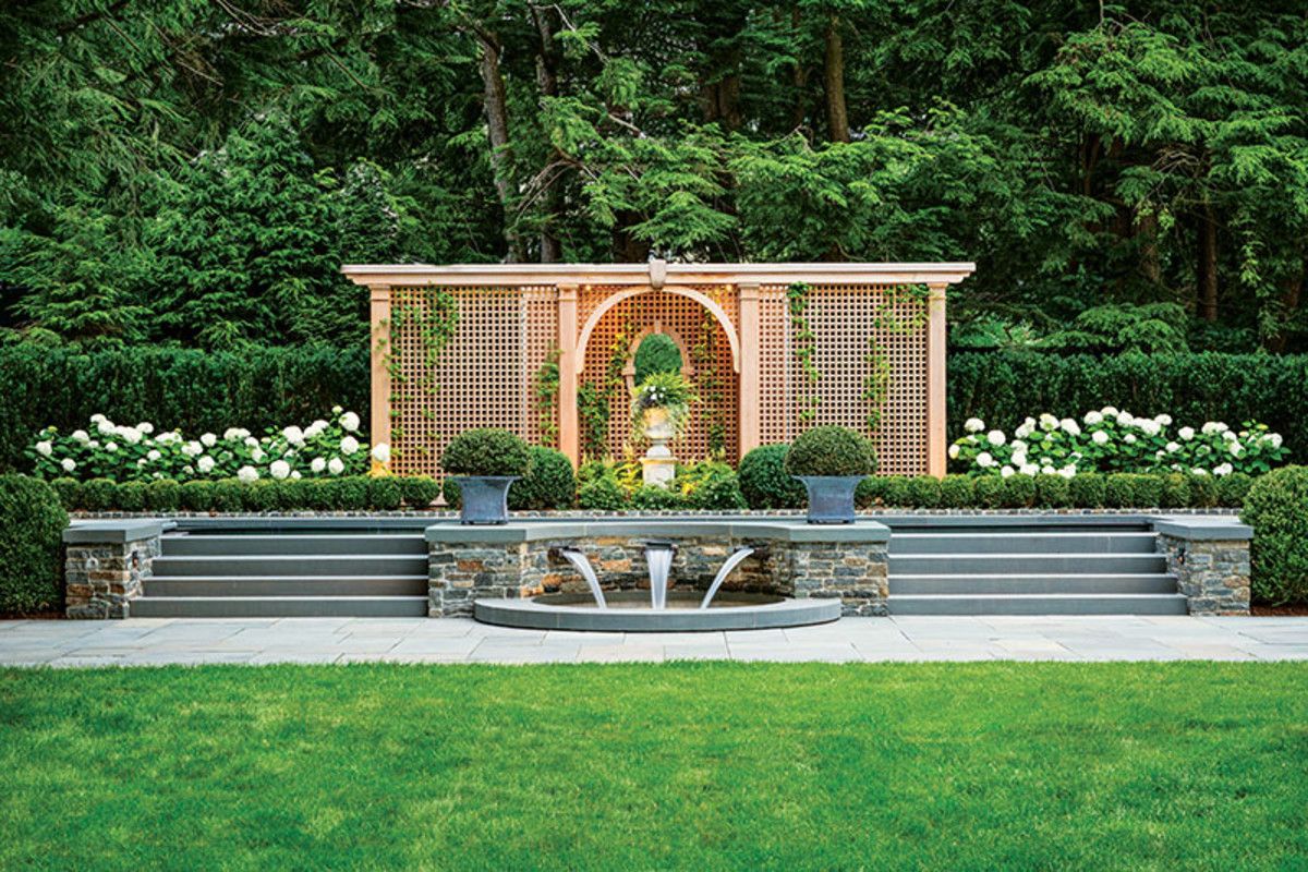 A dramatic garden scape in MA features a stunning pool and an outdoor living environment with classical flourishes. buff.ly/2ujfS5x