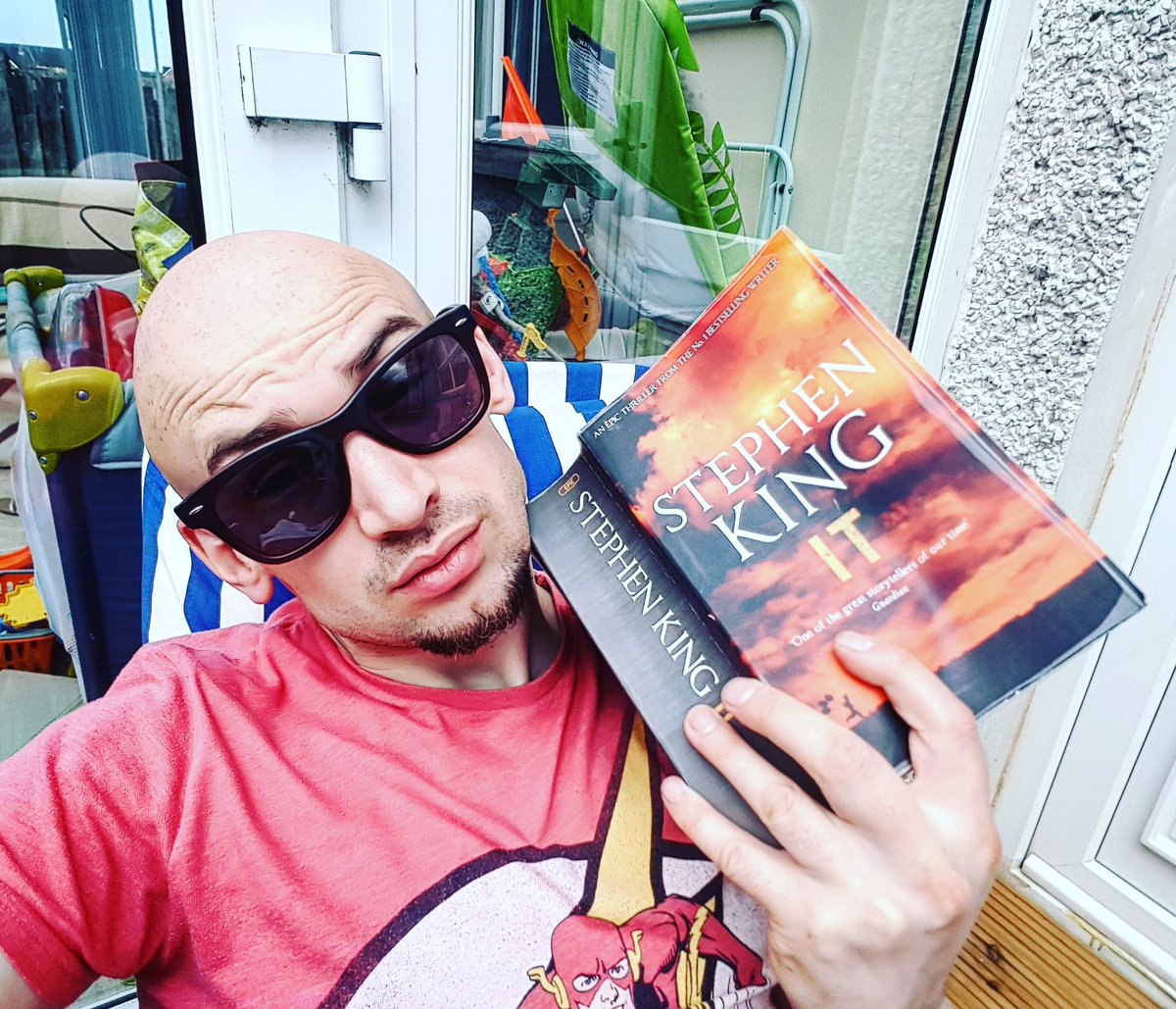 DaddydaycareYT's tweet photo. "We all float down here" enjoying this book out in the sun #it #pennywise #book #novel #sun #relax https://t.co/7hJu4GbrJ4