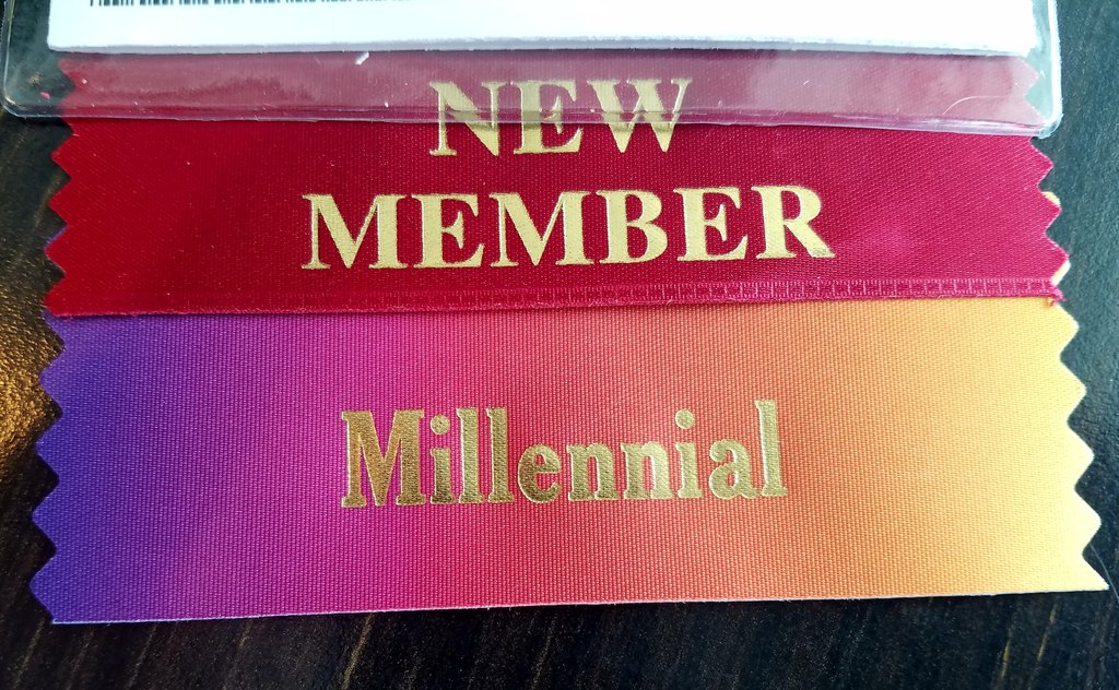 amy_anda's tweet photo. Loving my #millenial ribbon...in fancy rainbow too....now ISO a unicorn 🦄 #conferencelife https://t.co/x6au269Zvg