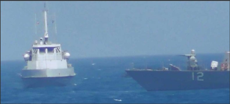 This is crazy close. .@USNavy released photo of #USSThunderbolt encounter today w/ #Iran IRGCN patrol boat - 150 yards