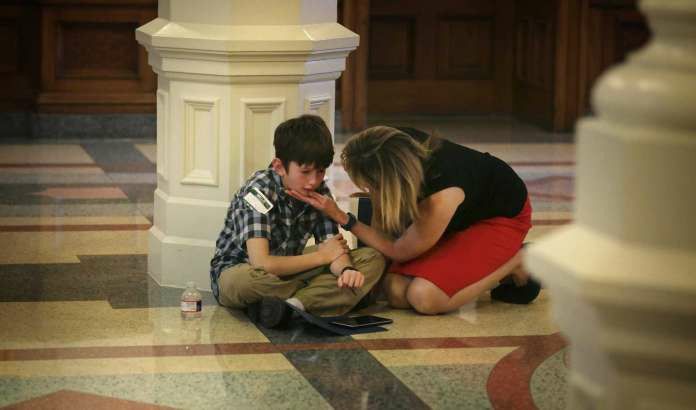 TransEquality's tweet photo. A Texas mom tells the story of the viral photo of her #trans son crying at the #TXlege https://t.co/pR6ECV4Lu2 via @mrsbriggle #YallMeansAll https://t.co/UyNqDwOWeo