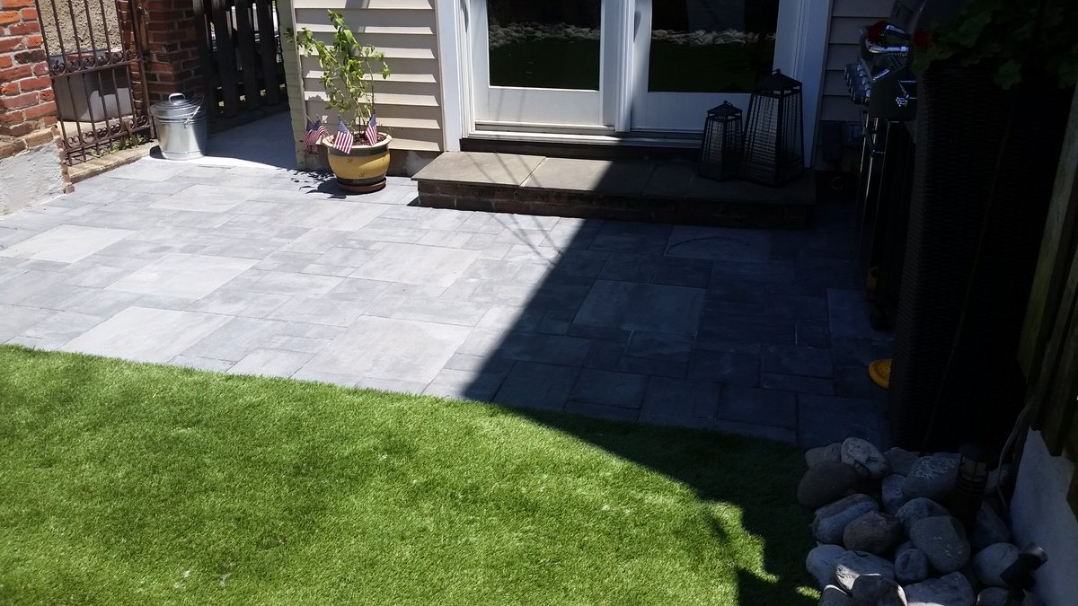PaversWallsMD's tweet photo. #BaltimoreCity paver patio with synthetic grass. #PatioBuilder https://t.co/0VnRUjYqAq