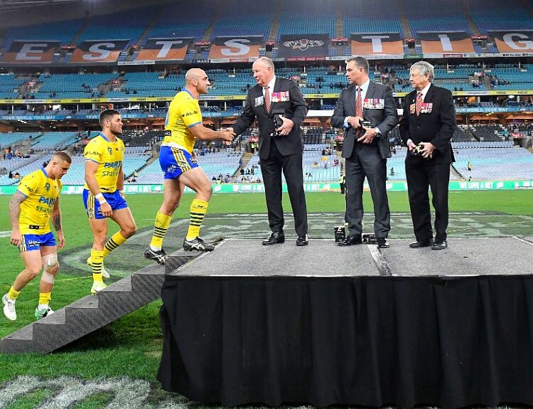 AllanSparkes's tweet photo. Proud as punch to be Patron of @TKYFdn &amp; present the Aust Bravery Coin to @tim_mannah &amp; @TheParraEels teammates at the #StayKind Cup game https://t.co/SgzifRtx1t
