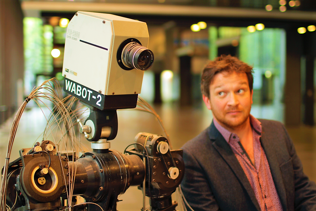 Argonon's tweet image. Rise of The Robots presenter, @Ben_garrod, with robot called “WABOT­‐2” created by Waseda University. Tonight, 9pm on @BBCFOUR #RobotsBBC