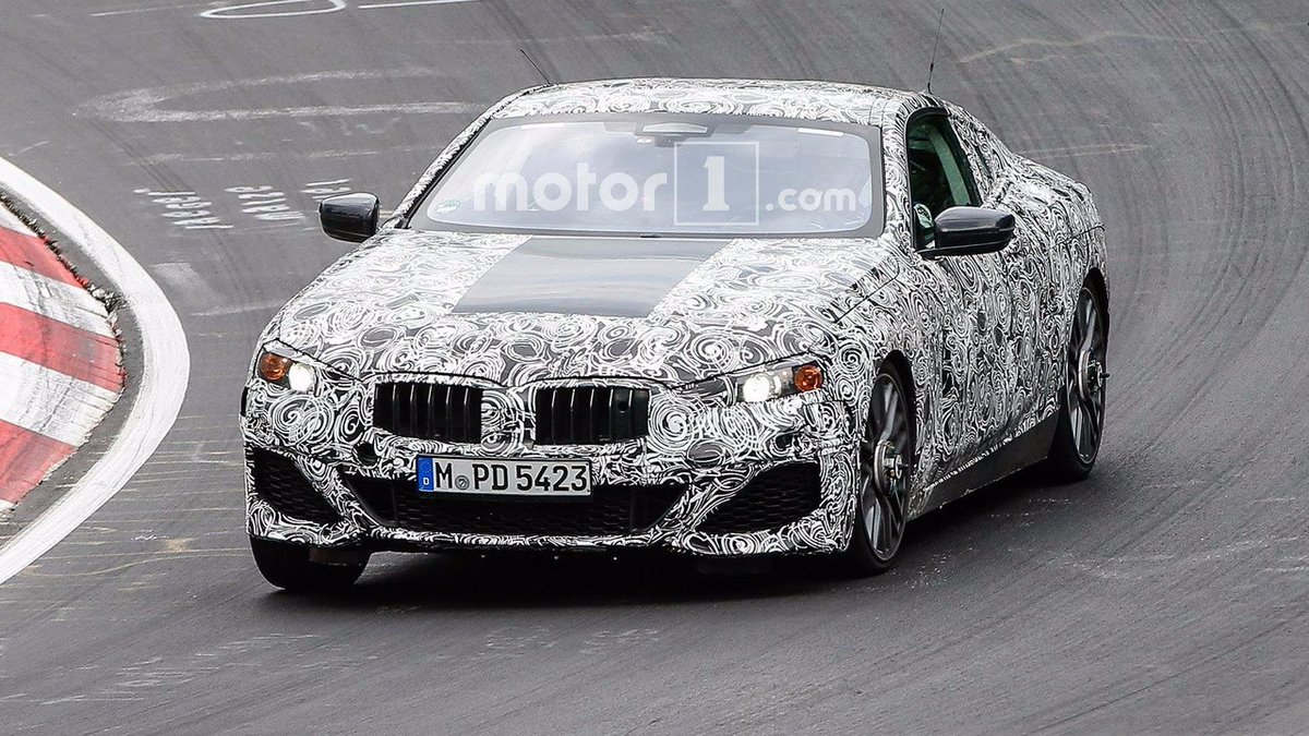 SPIED: The BMW 8 Series at the Nurburgring with a different face. How does it compare to the other test versions? → motor1.com/news/174904/bm…