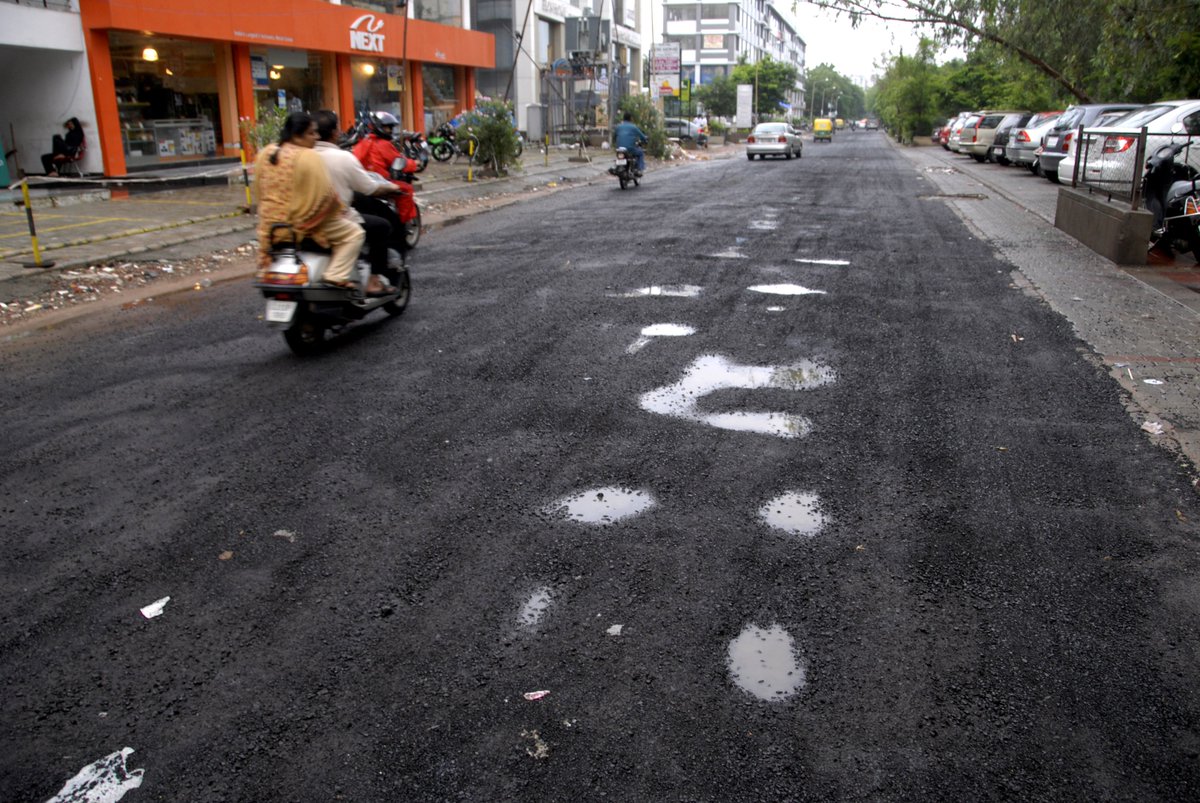 TewaryAnkur's tweet photo. Polka dots on #smartcity #Ahmedabad roads. All roads are in tatters #bigshame #developedGujarat? #AMC https://t.co/t1YERwsCc4