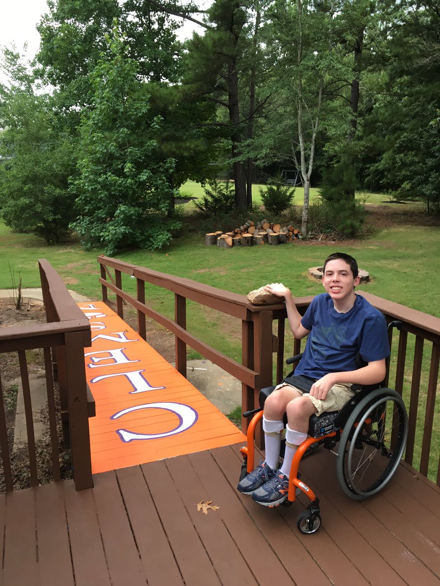 BillWires's tweet photo. @LoganWires touches The Rock B4 heading down The Hill for surgery. His biggest concern? Being healed up before the first Clemson Game. #hero https://t.co/DEpN7ZvD09