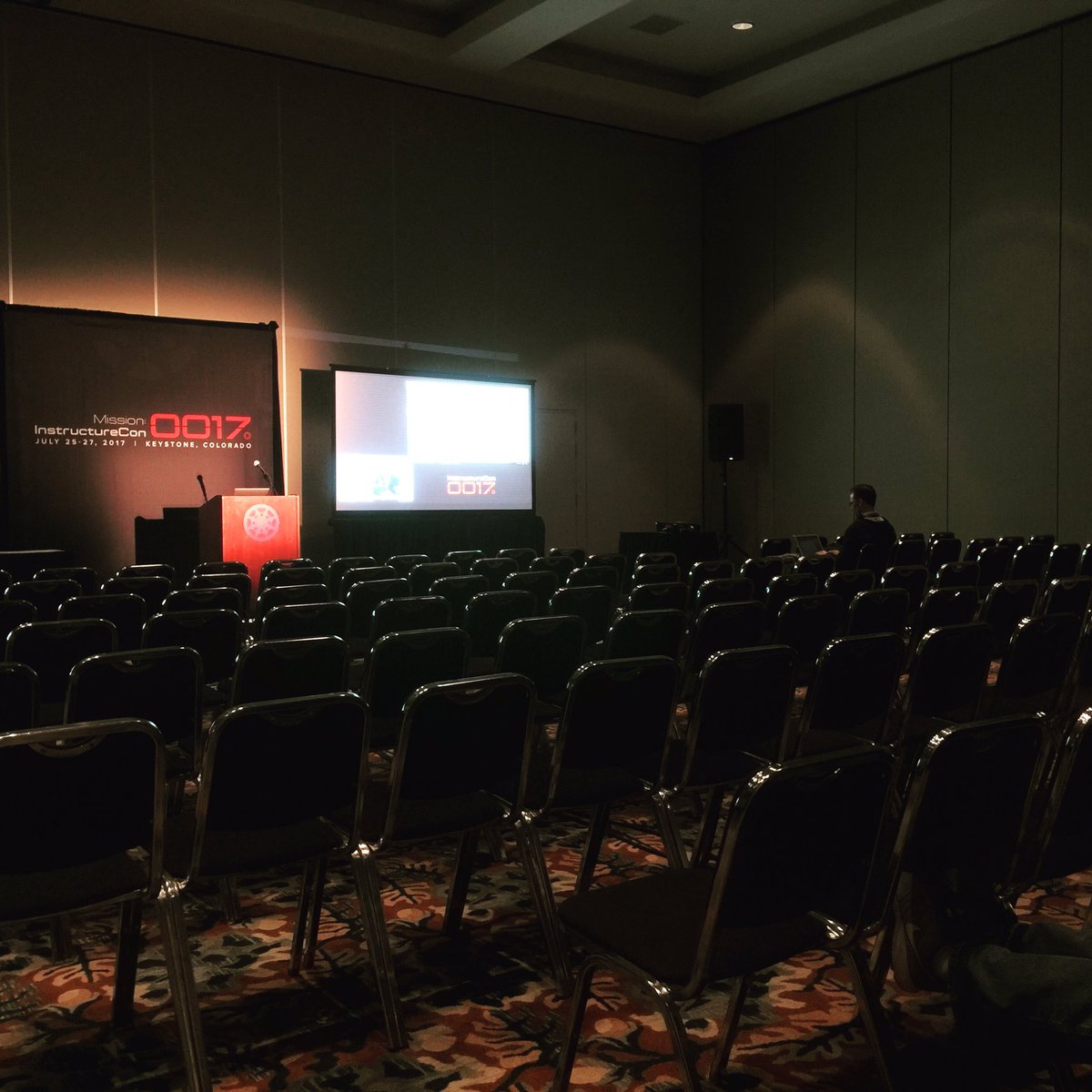 ejsherman's tweet photo. Dang! This Keynote is so empty. Oh, wait. I'm in an overflow room. Never mind. Much more comfortable, though. #instcon https://t.co/egNuyUidUc